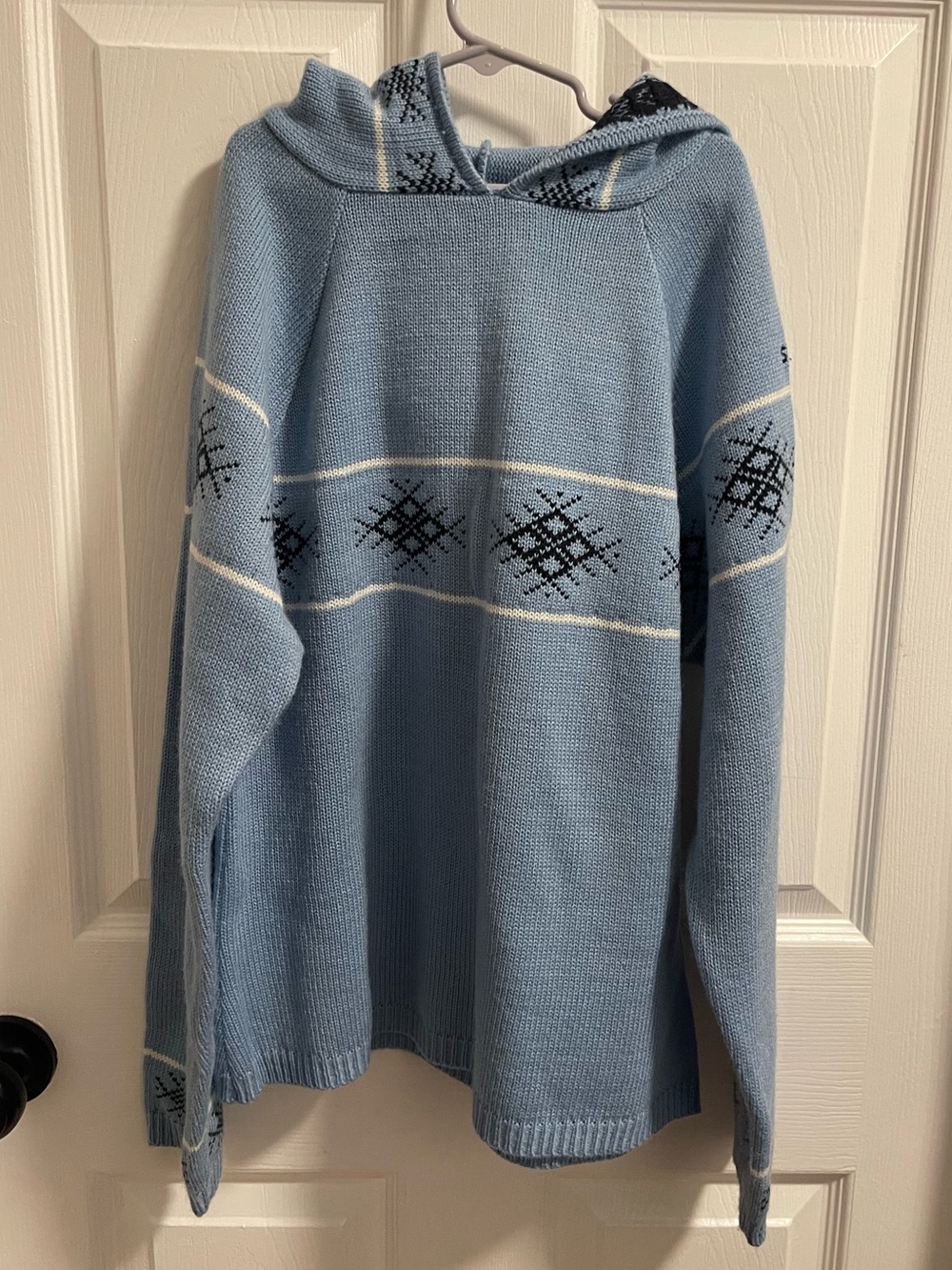 split Light Blue Hooded Knit Sweater with Black & White Nordic Pattern